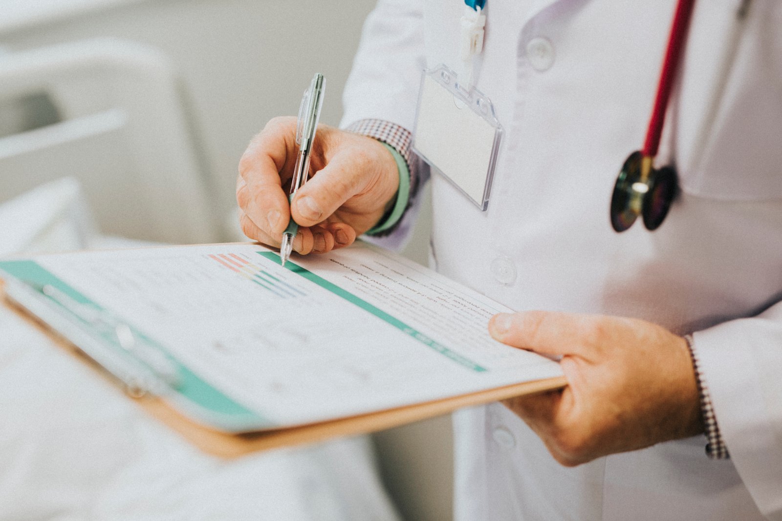 Doctor reviewing reports for gallstones and gallbladder disease