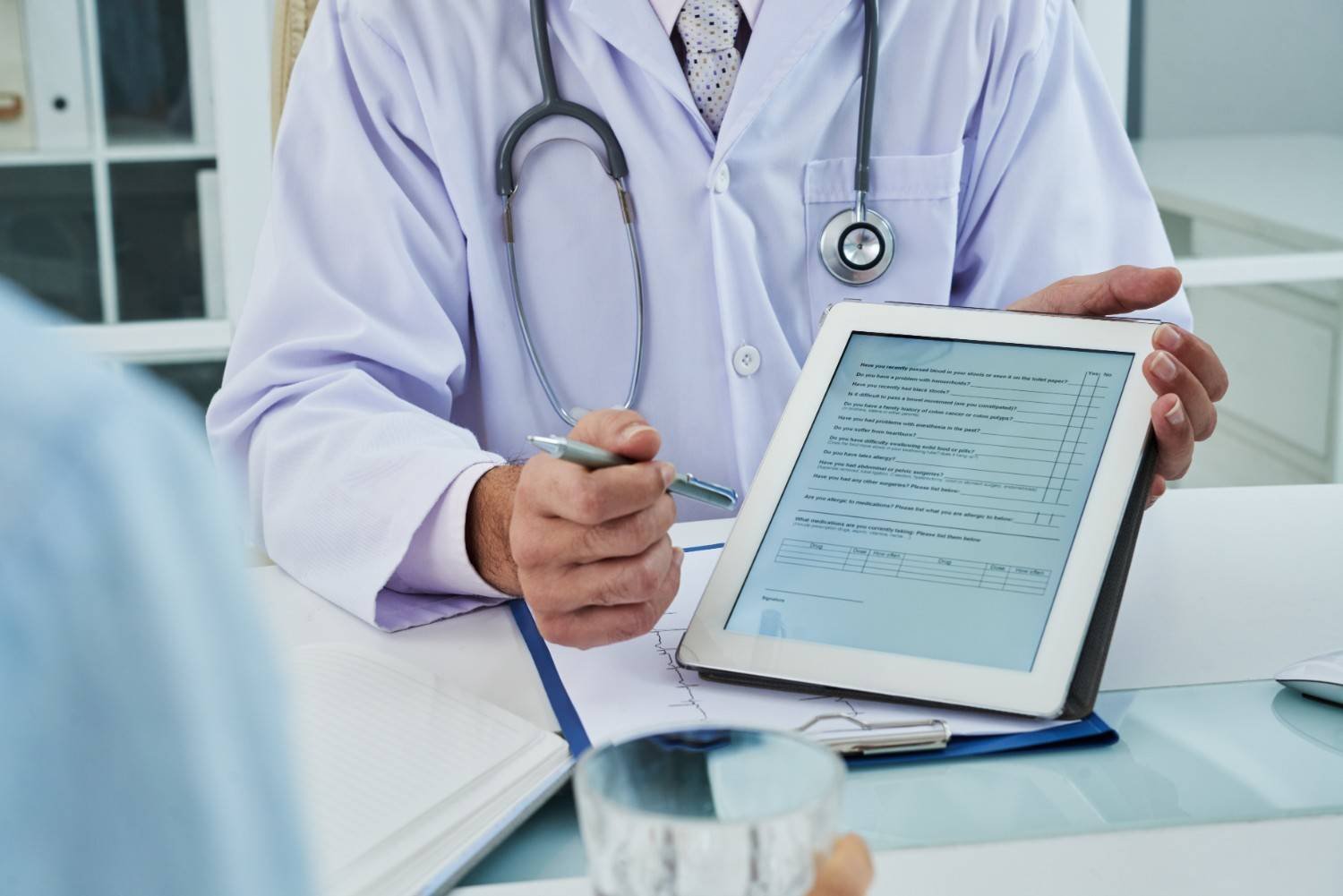 Doctor reviewing reports before double balloon enteroscopy